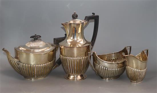 A Victorian matched demi-fluted silver four piece tea set, London and Sheffield 1898/9, gross 41 oz.